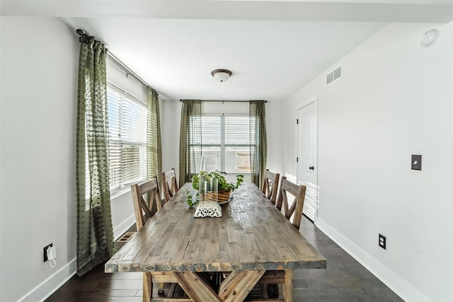 3504 Hawthorn Dr SW, Bondurant, IA 50035 - dining room with baseboards and dark wood finished floors