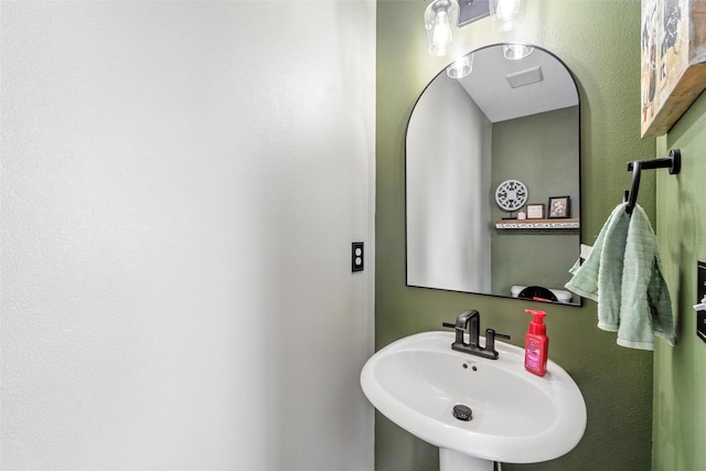 3504 Hawthorn Dr SW, Bondurant, IA 50035 - bathroom with a sink and a textured wall