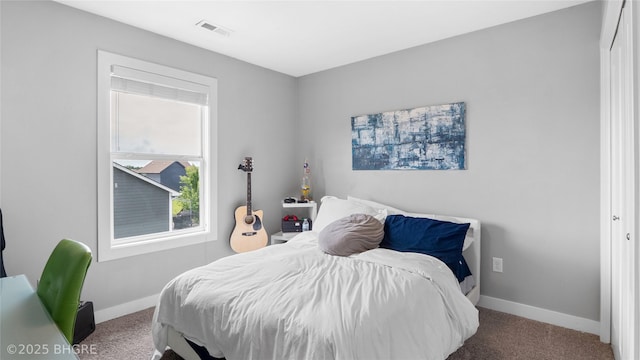 1208 NE 21st St, Grimes, IA 50111 - carpeted bedroom with baseboards