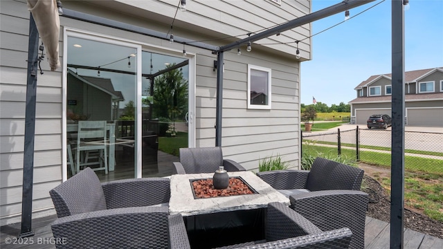 1208 NE 21st St, Grimes, IA 50111 - view of patio / terrace featuring a fire pit