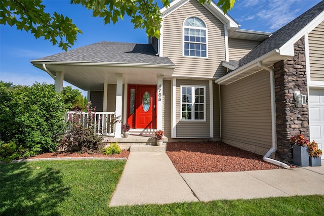 4785 Windsor Cir, Pleasant Hill, IA 50327 - view of front of property with a porch, a shingled roof, an attached garage, and a front yard