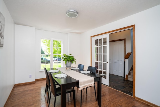 4785 Windsor Cir, Pleasant Hill, IA 50327 - dining room featuring dark wood-type flooring, french doors, and stairs