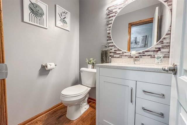 4785 Windsor Cir, Pleasant Hill, IA 50327 - half bath featuring vanity and wood finished floors