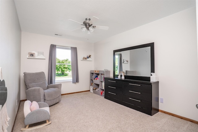 4785 Windsor Cir, Pleasant Hill, IA 50327 - sitting room featuring carpet flooring and a ceiling fan