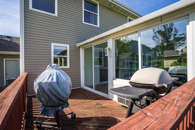 4785 Windsor Cir, Pleasant Hill, IA 50327 - wooden terrace with a sunroom and grilling area