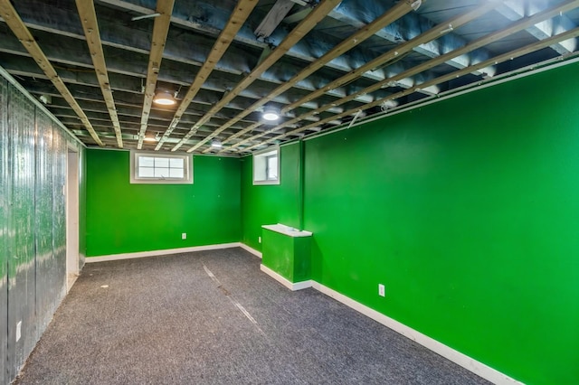 849 39th St, Des Moines, IA 50312 - below grade area featuring carpet floors and baseboards