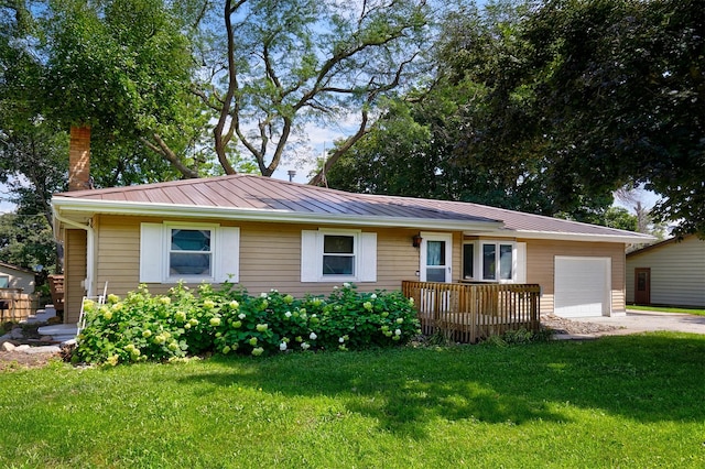 1612 Horse N Buggy Dr, Adel, IA 50003 - ranch-style house with an attached garage, a front lawn, driveway, a chimney, and a metal roof