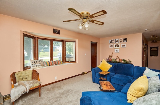 1612 Horse N Buggy Dr, Adel, IA 50003 - carpeted living area with ceiling fan and a textured ceiling