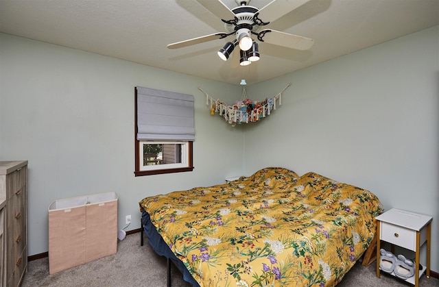 1612 Horse N Buggy Dr, Adel, IA 50003 - carpeted bedroom featuring baseboards and ceiling fan