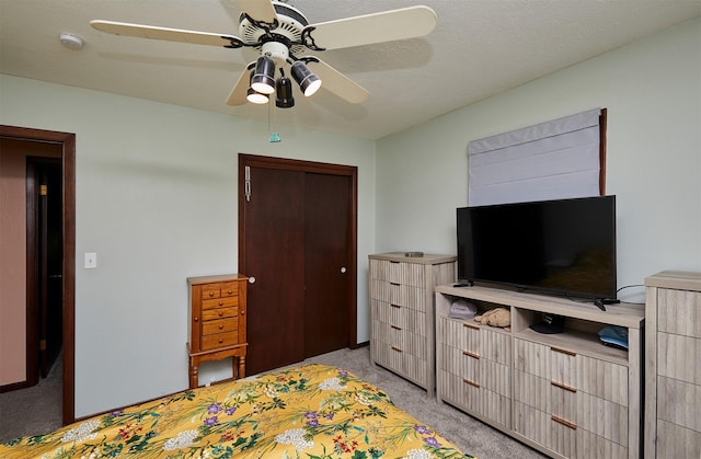 1612 Horse N Buggy Dr, Adel, IA 50003 - bedroom with light colored carpet, a closet, and a ceiling fan