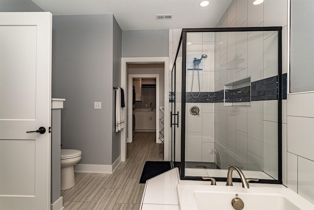 409 S St, Jewell, IA 50130 - full bathroom with a shower stall and recessed lighting