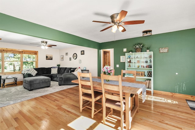 122 G76 Hwy, Lacona, IA 50139 - dining space with a ceiling fan and hardwood / wood-style floors