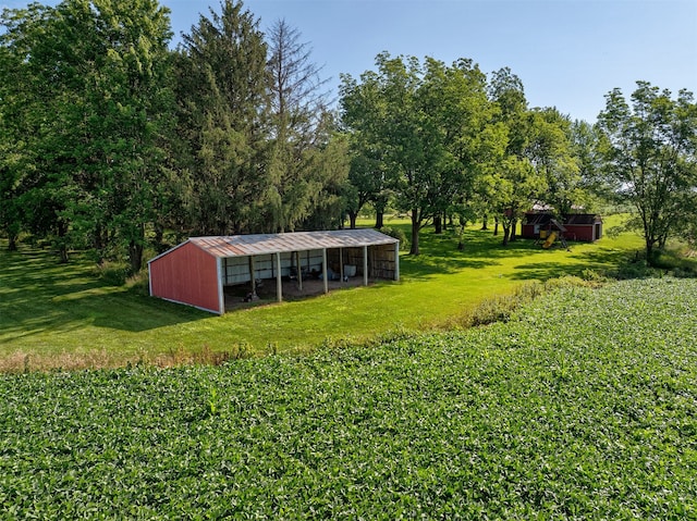 122 G76 Hwy, Lacona, IA 50139 - view of green lawn featuring an outbuilding