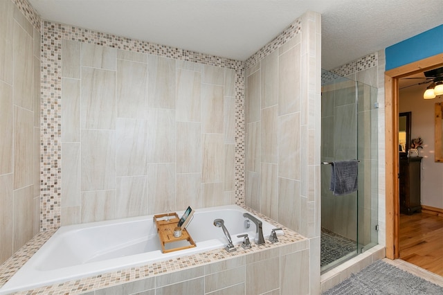 122 G76 Hwy, Lacona, IA 50139 - full bathroom with a shower stall and a garden tub