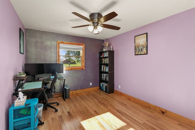 122 G76 Hwy, Lacona, IA 50139 - office area featuring light wood-style floors and ceiling fan