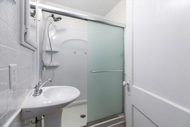 616 4th St, West Des Moines, IA 50265 - full bathroom with a stall shower and a sink
