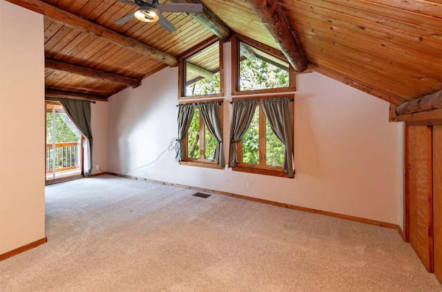 702 Jasper Ave NE, Mitchellville, IA 50169 - unfurnished living room with carpet, ceiling fan, and wooden ceiling
