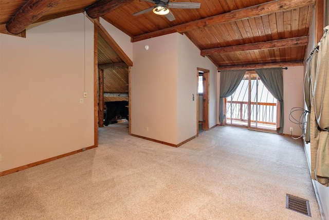 702 Jasper Ave NE, Mitchellville, IA 50169 - unfurnished living room with wooden ceiling, a ceiling fan, and light carpet