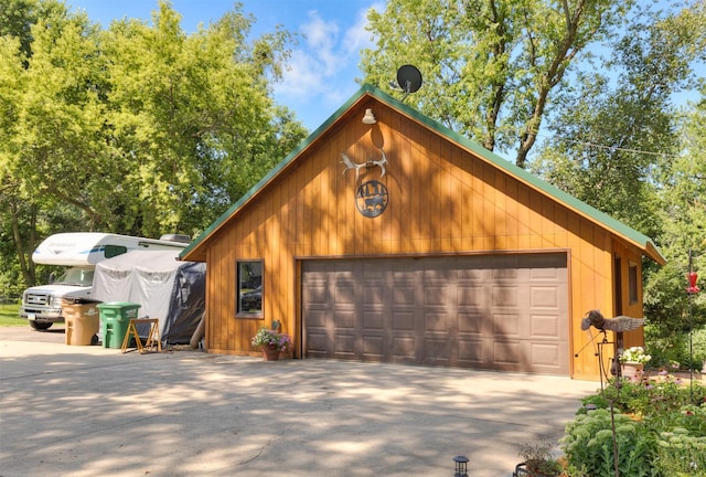 702 Jasper Ave NE, Mitchellville, IA 50169 - view of detached garage