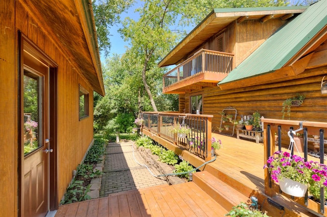702 Jasper Ave NE, Mitchellville, IA 50169 - view of wooden terrace