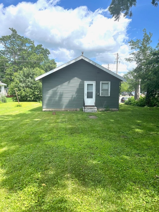 1348 Idaho St, Des Moines, IA 50316 - view of home's exterior with a lawn and entry steps