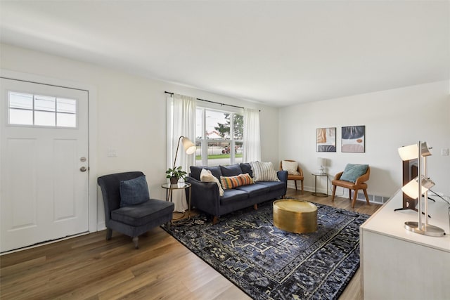 3025 Dean Ave, Des Moines, IA 50317 - living room with wood finished floors and plenty of natural light
