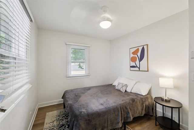 3025 Dean Ave, Des Moines, IA 50317 - bedroom with dark wood finished floors and baseboards