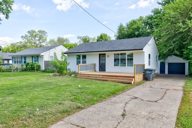 1437 E Pleasant View Dr, Des Moines, IA 50320 - view of front facade featuring an outdoor structure, a front yard, a garage, a shingled roof, and driveway