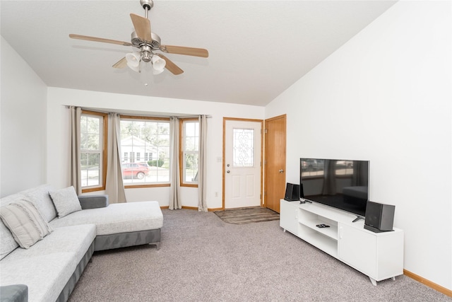 6217 Welker Ave, Des Moines, IA 50312 - carpeted living room featuring vaulted ceiling and a ceiling fan