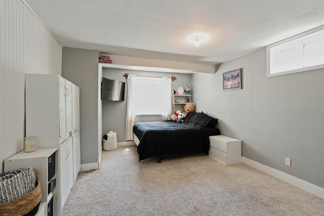 221 E Payton Ave, Des Moines, IA 50315 - bedroom with light colored carpet and baseboards