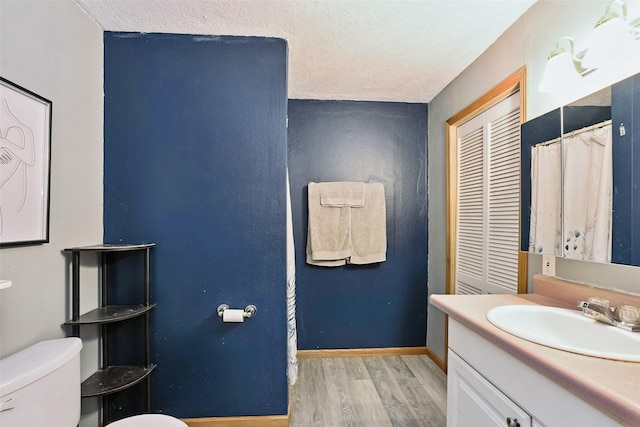 221 E Payton Ave, Des Moines, IA 50315 - full bath featuring wood finished floors and vanity
