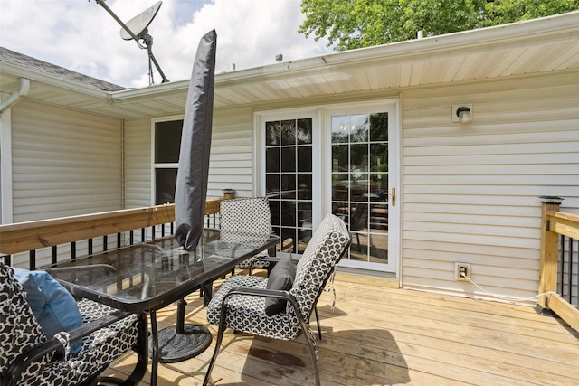 221 E Payton Ave, Des Moines, IA 50315 - wooden terrace featuring outdoor dining area