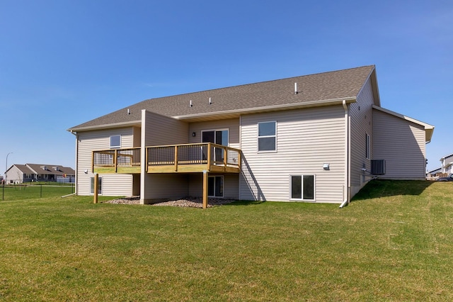 1102 Westview Dr, Huxley, IA 50124 - rear view of house featuring a deck and a yard