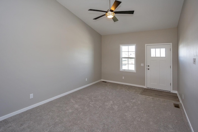 1102 Westview Dr, Huxley, IA 50124 - carpeted entrance foyer featuring a ceiling fan and lofted ceiling