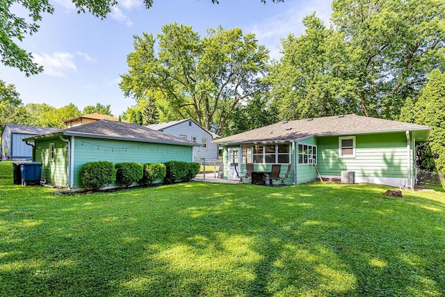 2525 27th Pl, Des Moines, IA 50310 - rear view of property featuring a sunroom