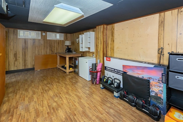 2525 27th Pl, Des Moines, IA 50310 - basement featuring wood finished floors and wooden walls