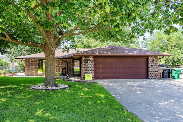 502 5th Ave SW, Altoona, IA 50009 - single story home with driveway, brick siding, and an attached garage