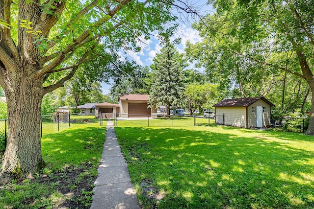 502 5th Ave SW, Altoona, IA 50009 - view of yard with a storage unit and a gate