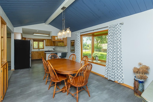 502 5th Ave SW, Altoona, IA 50009 - dining area featuring a chandelier and baseboards