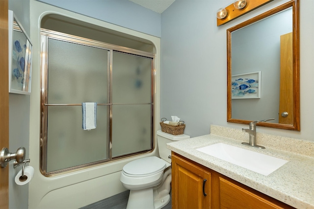 502 5th Ave SW, Altoona, IA 50009 - bathroom featuring vanity and combined bath / shower with glass door