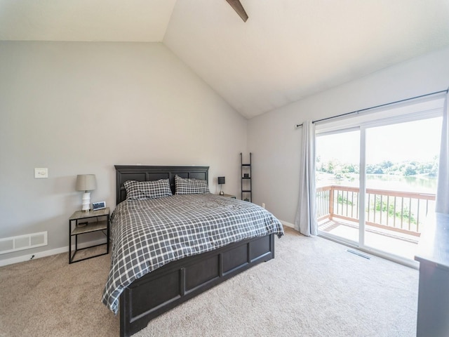 36508 Meadow Ln, Cumming, IA 50061 - bedroom with access to exterior, light colored carpet, and vaulted ceiling