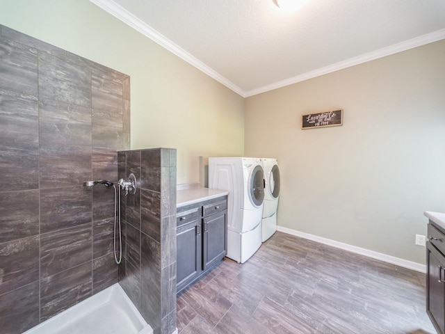 36508 Meadow Ln, Cumming, IA 50061 - laundry area with separate washer and dryer and crown molding