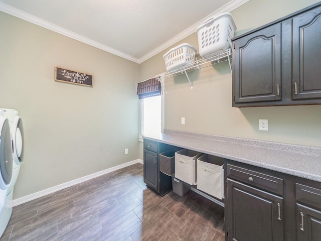 36508 Meadow Ln, Cumming, IA 50061 - laundry room featuring cabinet space, washer and dryer, ornamental molding, and dark wood-style floors
