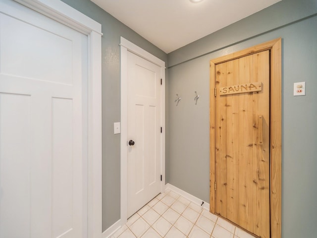 36508 Meadow Ln, Cumming, IA 50061 - entryway featuring baseboards and light tile patterned floors