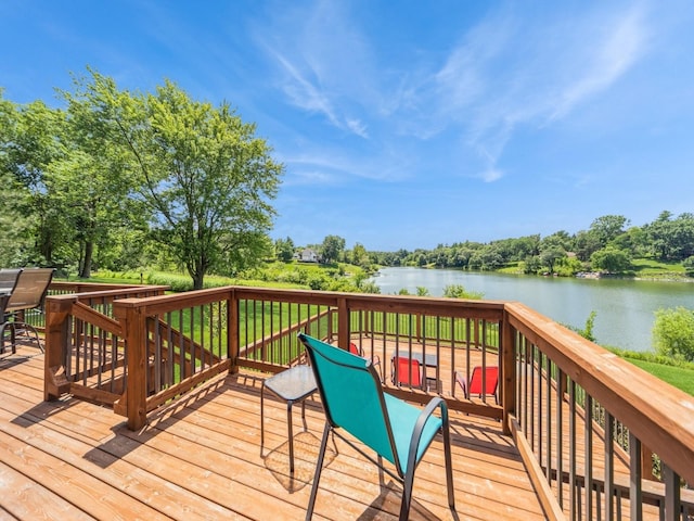36508 Meadow Ln, Cumming, IA 50061 - wooden terrace with a water view and view of scattered trees