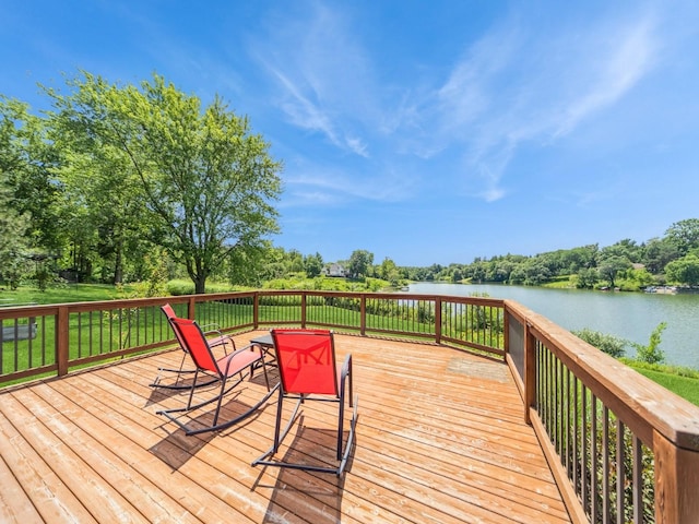 36508 Meadow Ln, Cumming, IA 50061 - deck with a water view and view of wooded area