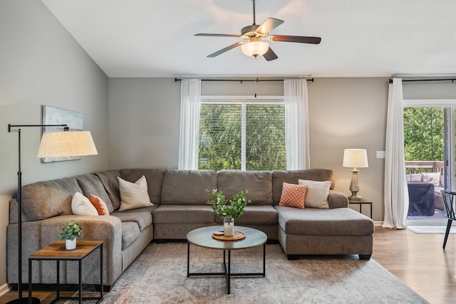4315 E 48th St, Des Moines, IA 50317 - living area featuring wood finished floors and a ceiling fan