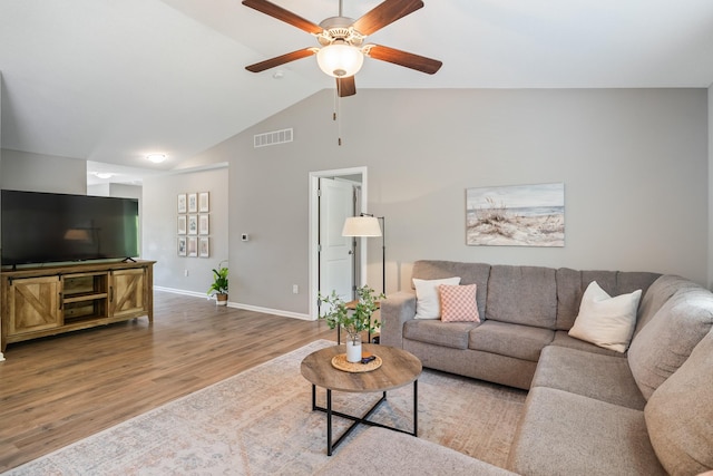 4315 E 48th St, Des Moines, IA 50317 - living area featuring wood finished floors, ceiling fan, and high vaulted ceiling