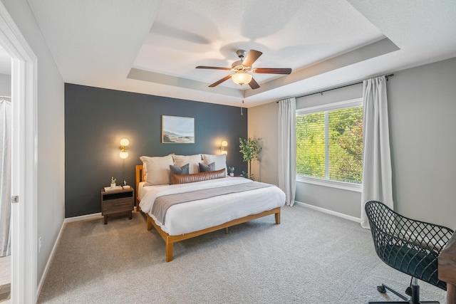 4315 E 48th St, Des Moines, IA 50317 - bedroom with a raised ceiling, carpet floors, and a ceiling fan