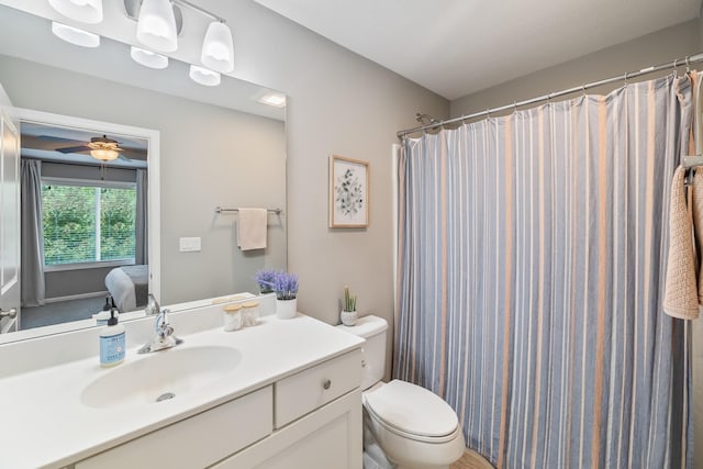 4315 E 48th St, Des Moines, IA 50317 - bathroom with vanity, a ceiling fan, and a shower with curtain